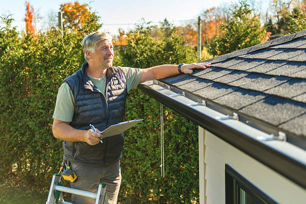 Professional Hail Damage Roof Repair technician working in Macon, MS